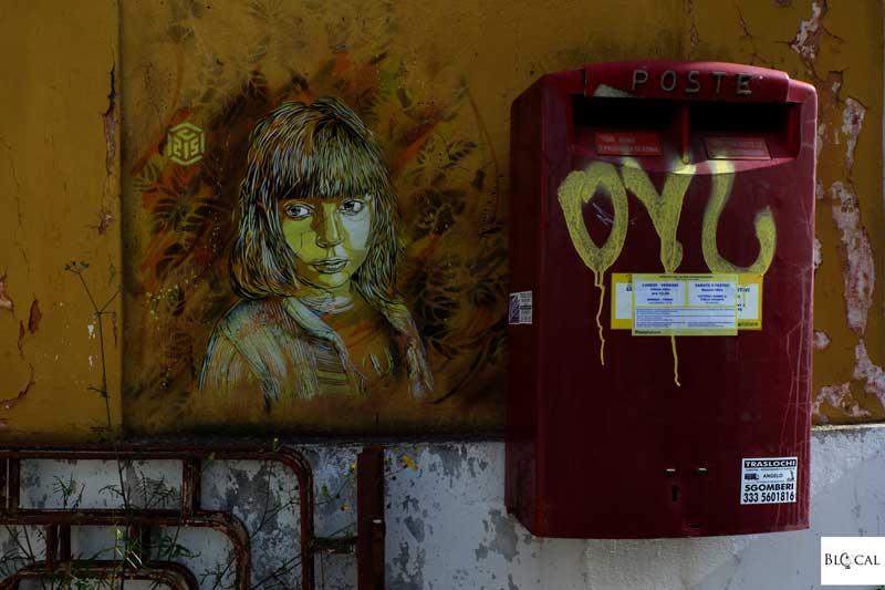 C215 stencil street art in Garbatella neighbourhood Rome