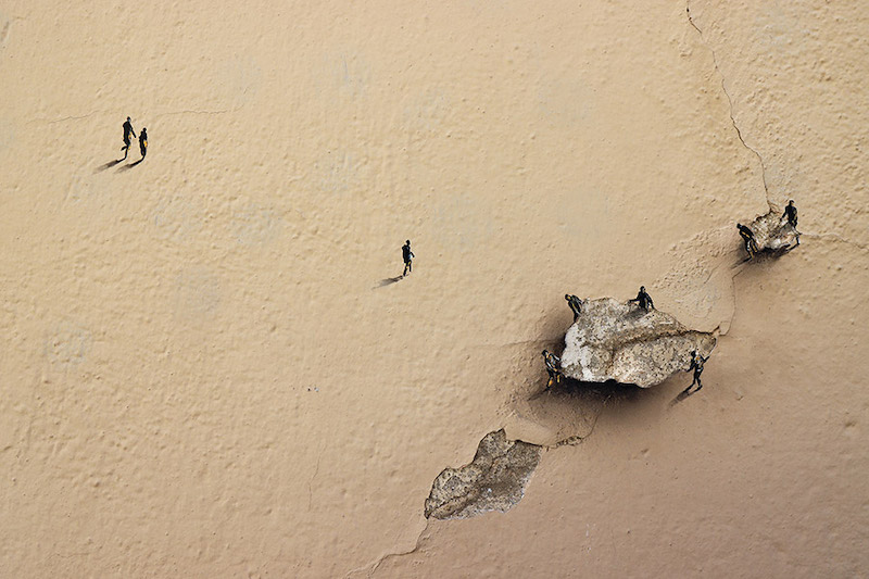 Everything is relative street art by Pejac in Madrid