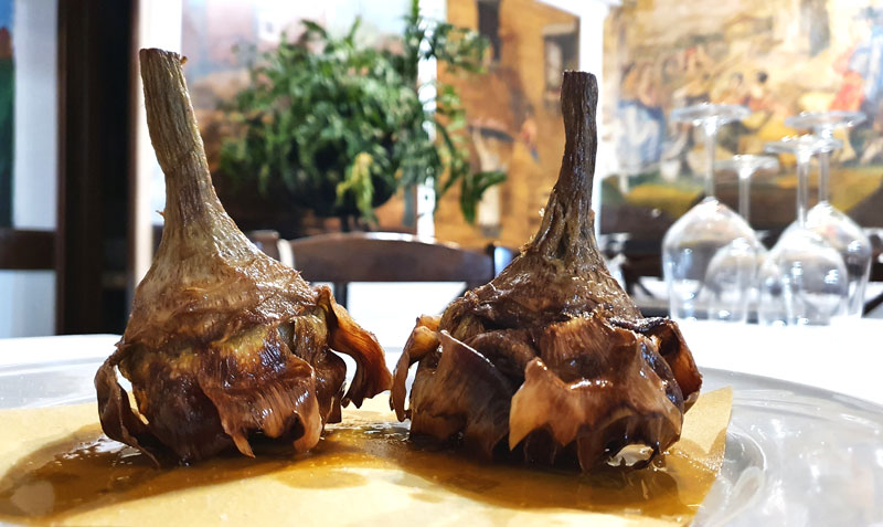 Carciofi alla giudia vegan traditional food from Rome