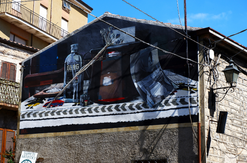Basik mural street art in Sardinia Aggius Italy Museo AAAperto.
