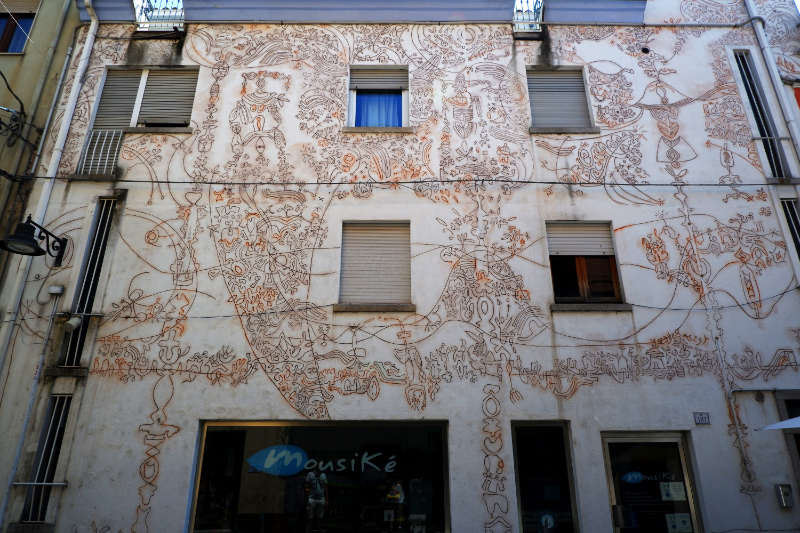 Street Art in Sardinia mural by Antonio Porru in Nuoro Italy.